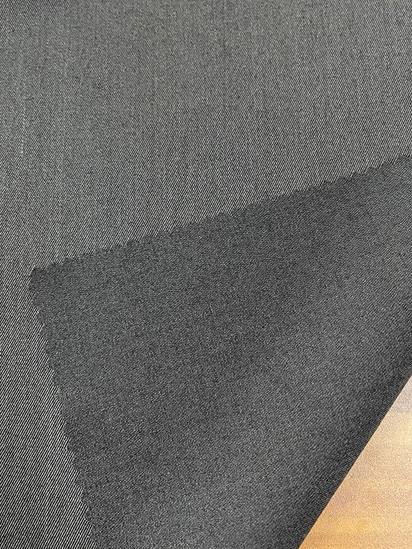 WOL SEPERTI TENUN AH-71723 65%T+32%R+3%WFdatar dan halus, dapat mencerminkan jejak tekstil halus dan menunjukkan temperamen mulia dari kain.